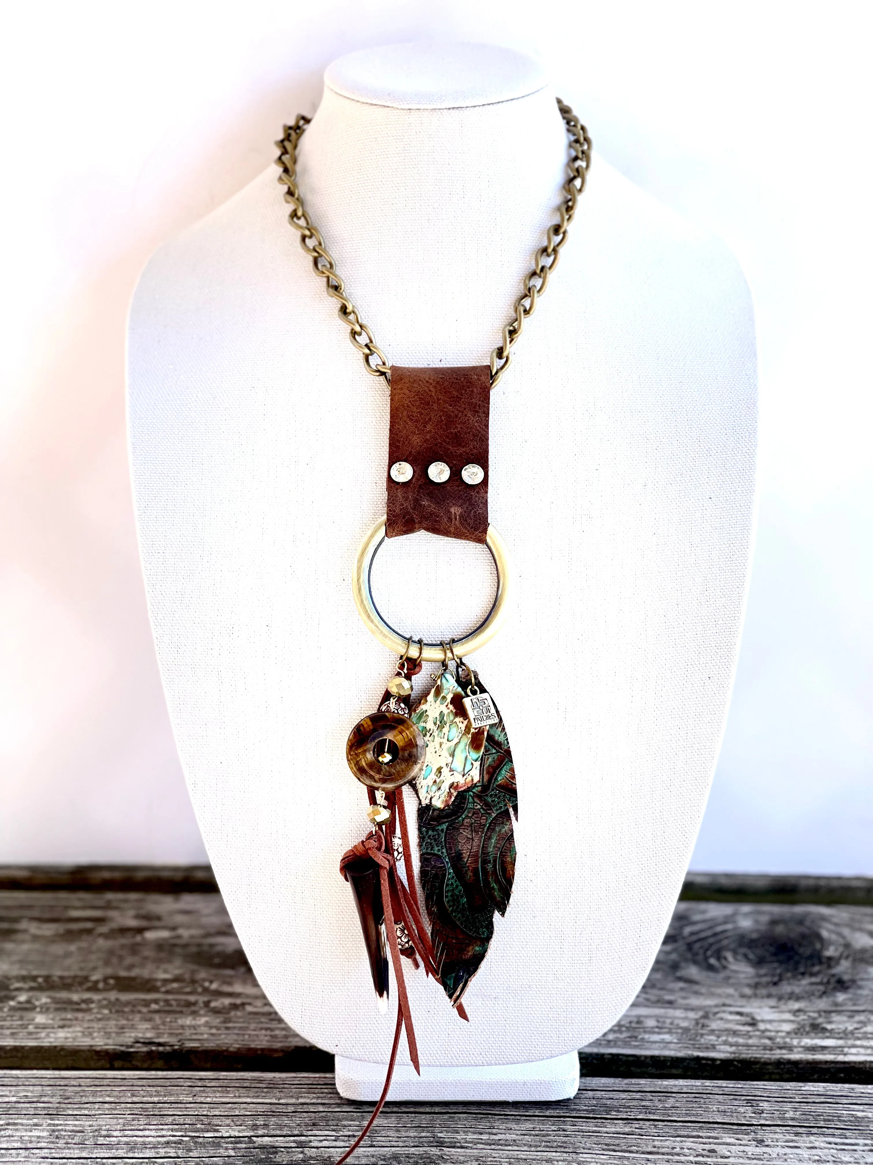 Limited Edition Leather chunky necklace with turquoise, feather and other statement pieces